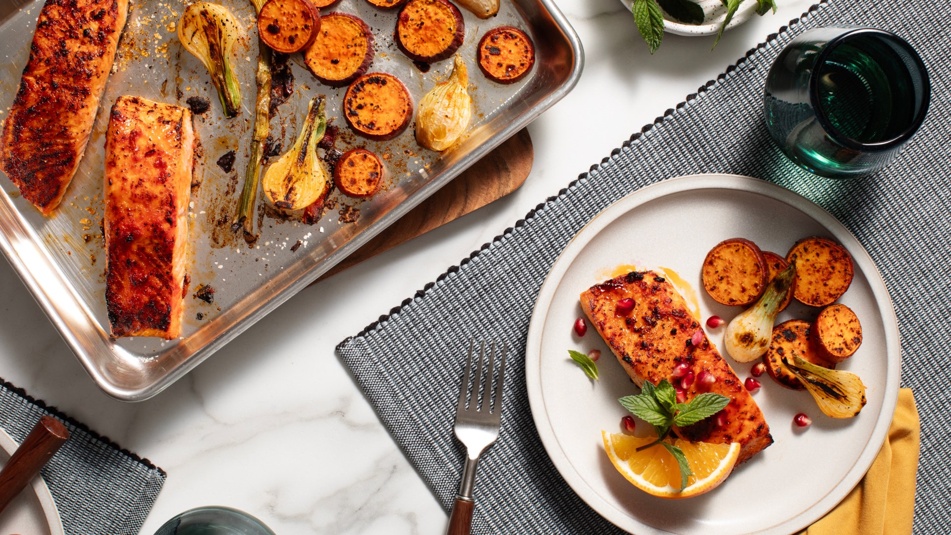 Cooked Salmon on a plate and cooking tray